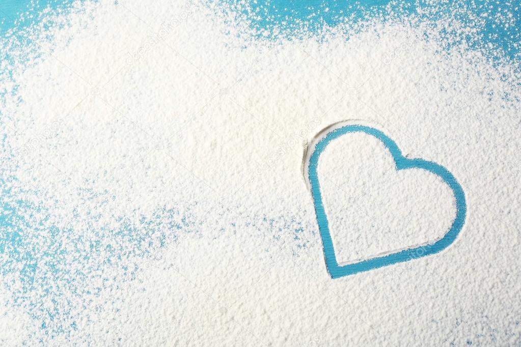 A heart shape drawn in flour